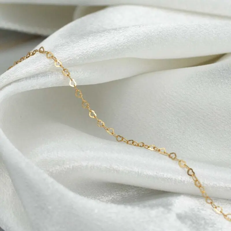 Pulsera delicada de oro 18K – joya sutil y femenina