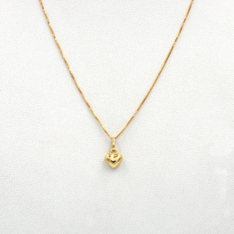 Conjunto Corazón Mini de oro 18k con cadena y colgante delicado.