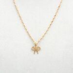 Conjunto Lazo de oro 18k con cadena y colgante delicado, joya femenina y elegante.