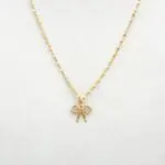 Conjunto Lazo de oro 18k con cadena y colgante delicado, joya femenina y elegante.