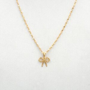 Conjunto Lazo de oro 18k con cadena y colgante delicado, joya femenina y elegante.