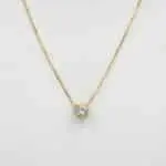 Cadena Punto de Luz de oro amarillo 18k con topacio natural.