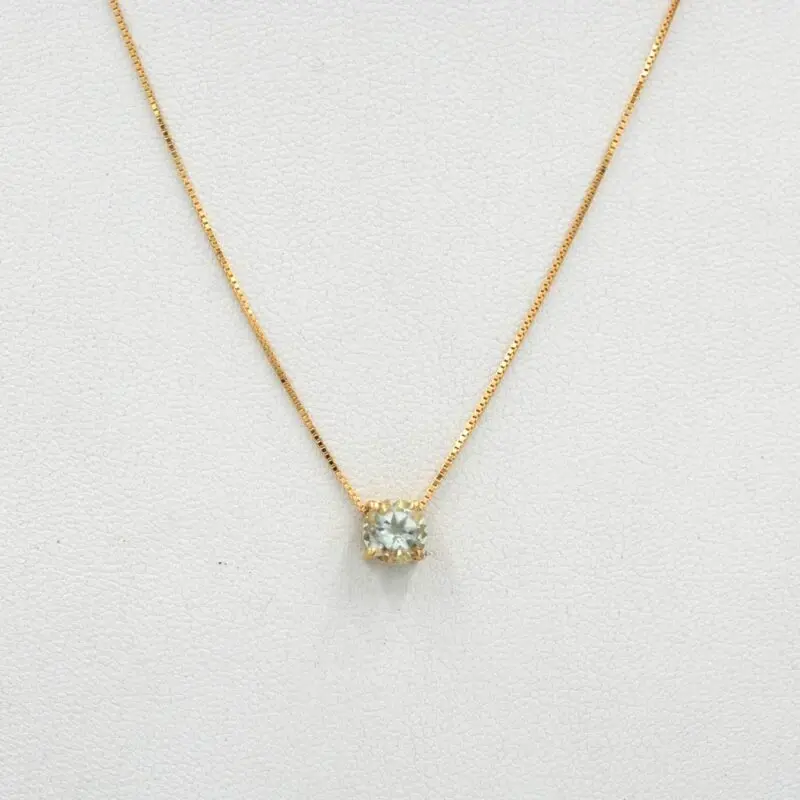 Cadena Punto de Luz de oro amarillo 18k con topacio natural.