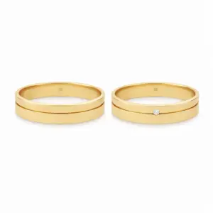 par de argollas de matrimonio oro amarillo 18k con diamante, modelo moderno y elegante