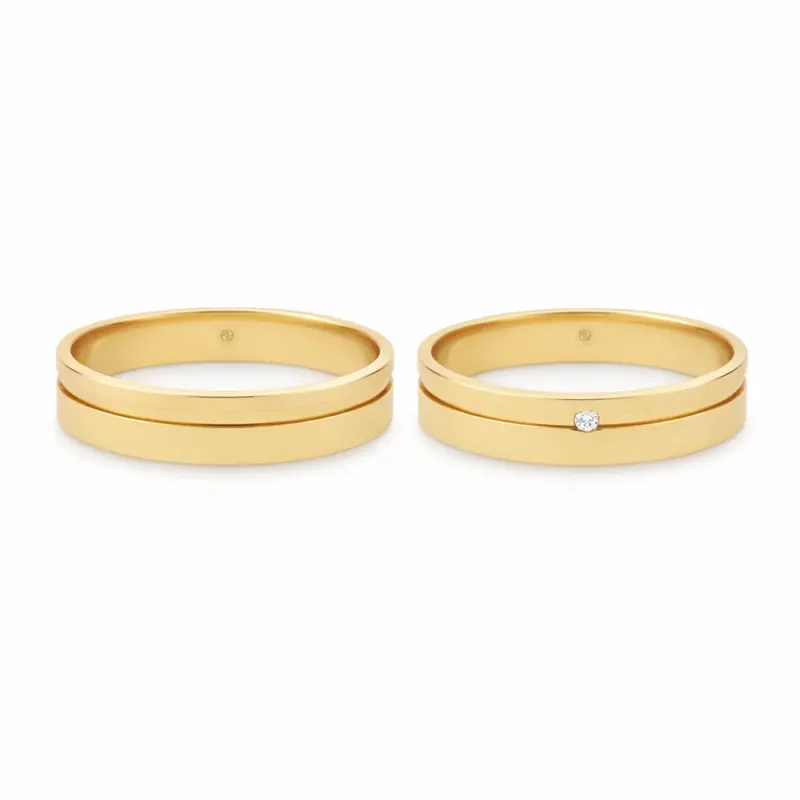 par de argollas de matrimonio oro amarillo 18k con diamante, modelo moderno y elegante