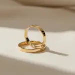 par de argollas flat oro amarillo 18k diseño moderno 2 mm