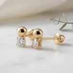 aros pequeños oro 18k bolita y piedra brillante