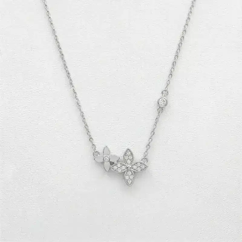 Conjunto Flor de plata italiana 925 con baño de rodio